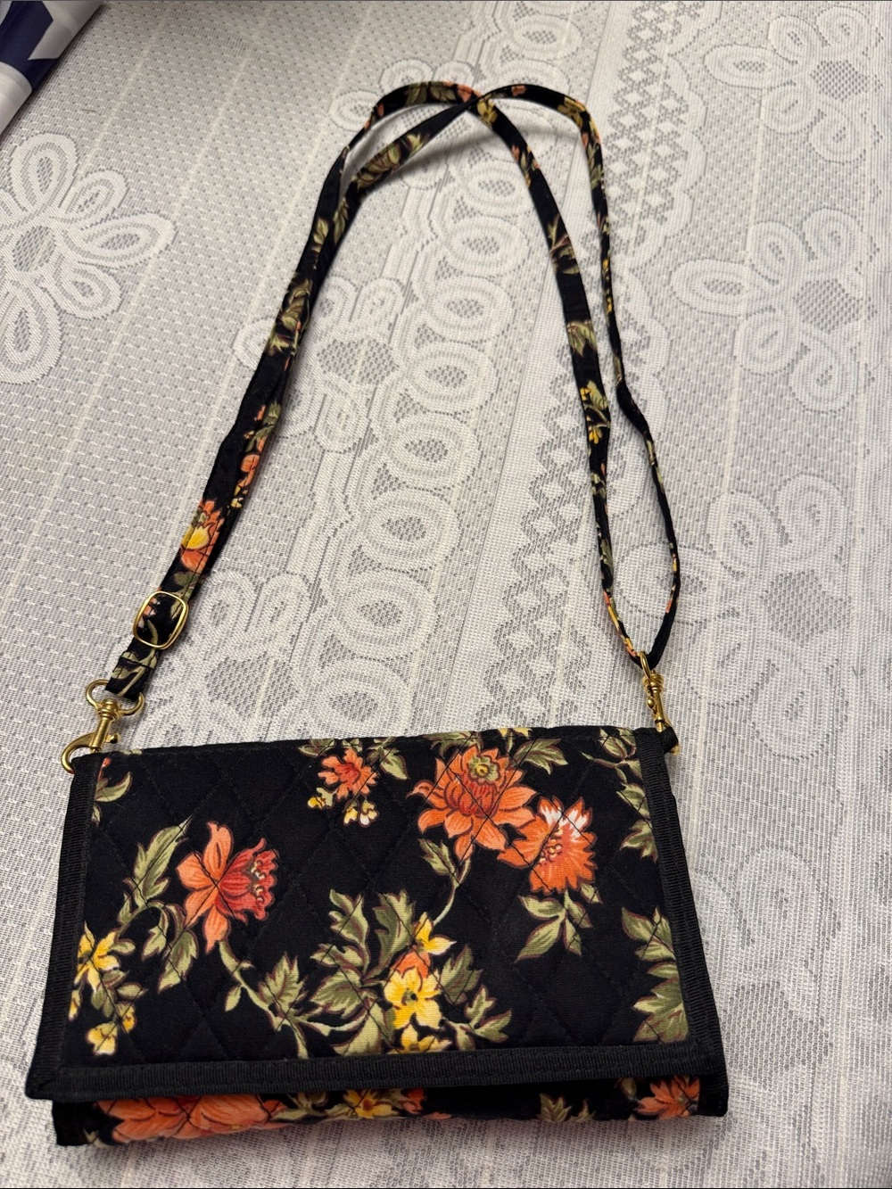 Floral QK ( Quilt Keepsake) quilted multi pocket crossover wallet purse.